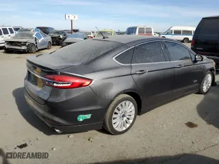 2017 Ford Fusion Energi Titanium with VIN 3FA6P0SU3HR277443, listed as a Copart auction lot 68062762 with 124,489 mi miles. Bid and sale history available at carsss.com. Image 3.
