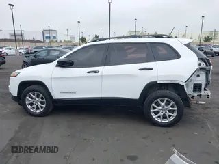 2015 Jeep Cherokee Sport z VIN 1C4PJMAB7FW635080, wystawiony jako IAAI lot #42062096 z przebiegiem 237 636 mil mil oraz . Historia ofert i sprzedaży dostępna na DreamBid. Obrazek 15.