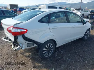 2018 Ford Fiesta S z VIN 3FADP4AJ2JM136775, wystawiony jako IAAI lot #42136725 z przebiegiem 47 072 mil mil oraz . Historia ofert i sprzedaży dostępna na DreamBid. Obrazek 4.