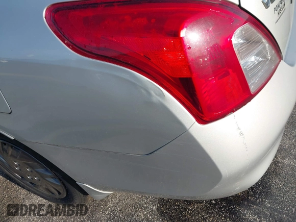 2013 Nissan Versa S Plus z VIN 3N1CN7APXDL851298, wystawiony jako IAAI lot #41900002 z przebiegiem 45 675 mil mil oraz . Historia ofert i sprzedaży dostępna na DreamBid. Obrazek 12.