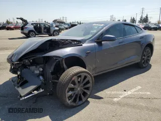 2020 Tesla Model S Long Range с VIN 5YJSA1E24LF402583, выставлен на аукционе Copart как лот 52025395 с пробегом 36 620 миль миль и Списание • Salvage title. История ставок и продаж доступна на DreamBid. Изображение 1.