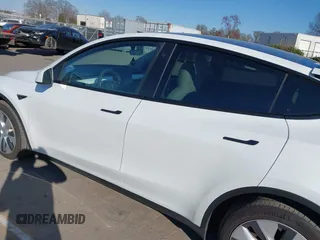 2023 Tesla Model Y Long Range with VIN 7SAYGDEE5PA094253, listed as a IAAI auction lot 41701966 with 29,458 mi miles and . Bid and sale history available at DreamBid. Image 14.