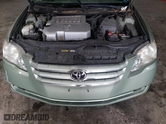 2006 Toyota Avalon XL z VIN 4T1BK36B46U090893, wystawiony jako Copart lot #60064325 z przebiegiem 142 546 mil mil oraz Czysty tytuł • Clean title. Historia ofert i sprzedaży dostępna na DreamBid. Obrazek 11.