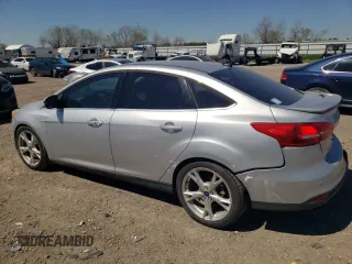 2015 Ford Focus Titanium with VIN 1FADP3J2XFL334046, listed as a Copart auction lot 48538825 with 98,322 mi miles and Non Repairable. Bid and sale history available at carsss.com. Image 2.