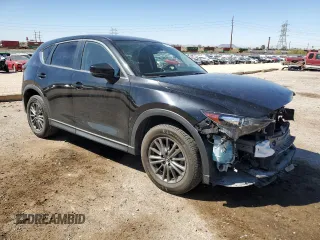 2017 Mazda CX-5 Touring z VIN JM3KFBCL4H0184922, wystawiony jako Copart lot #50166195 z przebiegiem 86 270 mil mil oraz Szkoda całkowita • Salvage title. Historia ofert i sprzedaży dostępna na DreamBid. Obrazek 4.
