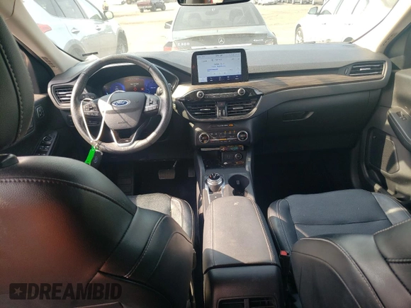 2020 Ford Escape Titanium z VIN 1FMCU9J97LUB25055, wystawiony jako Copart lot #60326945 z przebiegiem 78 711 mil mil oraz Szkoda całkowita • Salvage title. Historia ofert i sprzedaży dostępna na DreamBid. Obrazek 8.