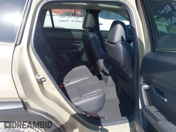 2024 Mazda CX-50 Premium z VIN 7MMVABDYXRN229669, wystawiony jako IAAI lot #41999385 z przebiegiem 10 882 mil mil oraz . Historia ofert i sprzedaży dostępna na DreamBid. Obrazek 8.