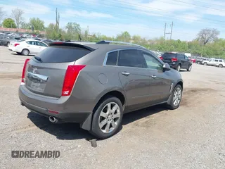 2011 Cadillac SRX Premium Collection with VIN 3GYFNFEY7BS519548, listed as a IAAI auction lot 42097305 with 124,083 mi miles and . Bid and sale history available at DreamBid. Image 4.