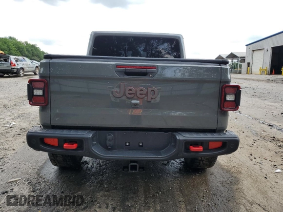 2021 Jeep Gladiator Rubicon с VIN 1C6JJTBG5ML507579, выставлен на аукционе Copart как лот 60409785 с пробегом 62 585 миль миль и Списание • Salvage title. История ставок и продаж доступна на DreamBid. Изображение 6.