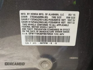 2015 Honda Pilot SE with VIN 5FNYF4H30FB076934, listed as a IAAI auction lot 41810621 with 203,871 mi miles and . Bid and sale history available at DreamBid. Image 9.