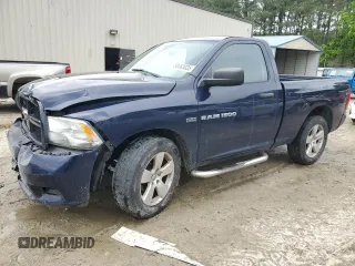 2012 Ram 1500 Express with VIN 3C6JD6AT9CG277077, listed as a Copart auction lot 58363035 with 156,592 mi miles and Salvage title. Bid and sale history available at DreamBid. Image 1.