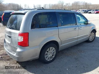 2013 Chrysler Town & Country Touring L with VIN 2C4RC1CG6DR660858, listed as a IAAI auction lot 41970976 with 140,299 mi miles and . Bid and sale history available at DreamBid. Image 4.