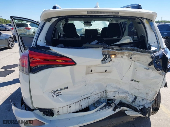 2016 Toyota RAV4 XLE with VIN JTMWFREV3GJ082487, listed as a IAAI auction lot 41833158 with 107,332 mi miles. Bid and sale history available at carsss.com. Image 6.