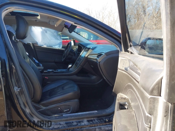 2013 Ford Fusion Titanium Hybrid with VIN 3FA6P0RU5DR339716, listed as a IAAI auction lot 41405835 with 197,840 mi miles. Bid and sale history available at carsss.com. Image 5.