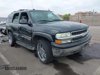 2004 Chevrolet Tahoe LT with VIN 1GNEK13T54J146851, listed as a IAAI auction lot 41990571 with 172,025 mi miles. Bid and sale history available at carsss.com. Image 1.