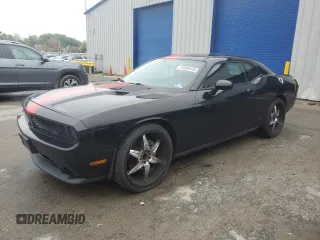 2012 Dodge Challenger SXT Plus z VIN 2C3CDYAG5CH292454, wystawiony jako Copart lot #57859475 z przebiegiem 226 007 mil mil oraz Szkoda całkowita • Salvage title. Historia ofert i sprzedaży dostępna na DreamBid. Obrazek 1.