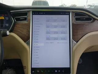 2016 Tesla Model X 70D with VIN 5YJXCBE2XGF019095, listed as a IAAI auction lot 42025230 with 109,660 mi miles and . Bid and sale history available at carsss.com. Image 7.