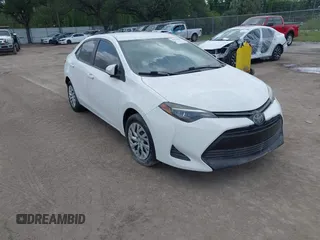 2019 Toyota Corolla L with VIN 5YFBURHE7KP908794, listed as a IAAI auction lot 38524964 with 65,069 mi miles. Bid and sale history available at carsss.com. Image 1.