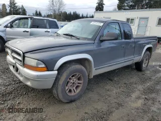 2003 Dodge Dakota SLT with VIN 1D7HL42X33S328572, listed as a Copart auction lot 43112125 with 0 mi miles and Salvage Title. Bid and sale history available at carsss.com. Image 1.