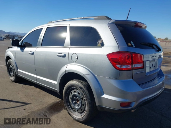 2019 Dodge Journey SE with VIN 3C4PDCBG0KT701223, listed as a IAAI auction lot 41286446 with 71,572 mi miles and . Bid and sale history available at DreamBid. Image 3.
