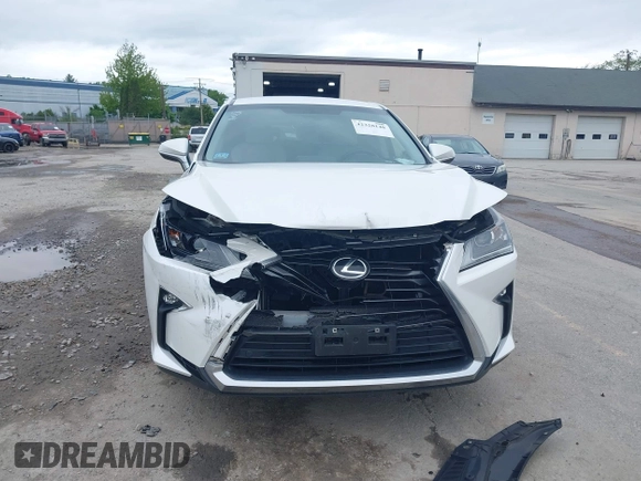 2016 Lexus RX 350 z VIN 2T2BZMCA4GC004770, wystawiony jako IAAI lot #42320148 z przebiegiem 77 054 mil mil oraz . Historia ofert i sprzedaży dostępna na DreamBid. Obrazek 6.