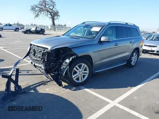 2016 Mercedes-Benz GL with VIN 4JGDF6EE1GA700391, listed as a IAAI auction lot 41309028 with 58,741 mi miles. Bid and sale history available at carsss.com. Image 2.