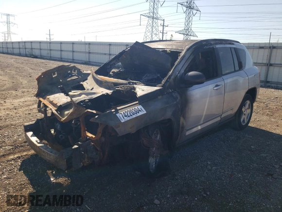 2010 Jeep Compass Sport with VIN 1J4NF4FB1AD672772, listed as a Copart auction lot 74220304 with 0 mi miles and Salvage Title. Bid and sale history available at carsss.com. Image 1.