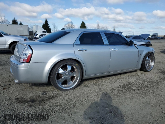 2005 Chrysler 300 C with VIN 2C3AA63H15H674199, listed as a Copart auction lot 47628215 with 154,052 mi miles and Salvage Title. Bid and sale history available at DreamBid. Image 3.
