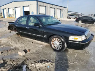 2011 Mercury Grand Marquis LS with VIN 2MEBM7FV0BX608564, listed as a Copart auction lot 48513095 with 128,241 mi miles and Salvage Title. Bid and sale history available at carsss.com. Image 4.