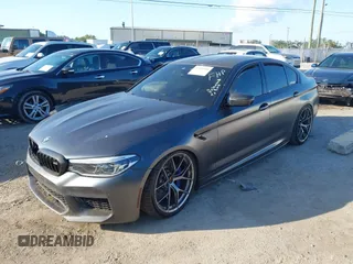 2019 BMW M5 Competition z VIN WBSJF0C59KB447419, wystawiony jako IAAI lot #41997505 z przebiegiem 74 990 mil mil oraz . Historia ofert i sprzedaży dostępna na DreamBid. Obrazek 17.