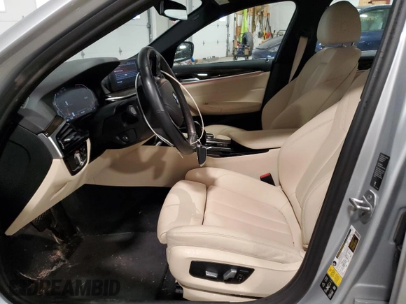 2020 BMW 5 Series 530i xDrive with VIN WBAJR7C09LCE58704, listed as a Copart auction lot 49900615 with 33,167 mi miles and Salvage title. Bid and sale history available at DreamBid. Image 7.