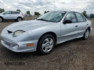 2002 Pontiac Sunfire SE z VIN 1G2JB524527232488, wystawiony jako Copart lot #61020675 z przebiegiem 127 394 mil mil oraz Czysty tytuł • Clean title. Historia ofert i sprzedaży dostępna na DreamBid. Obrazek 1.