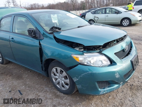2009 Toyota Corolla with VIN JTDBL40E29J017358, listed as a IAAI auction lot 41041604 with 233,205 mi miles. Bid and sale history available at carsss.com. Image 17.