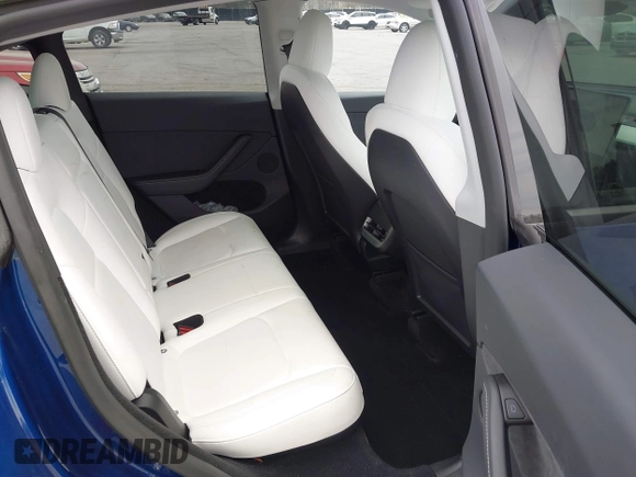 2023 Tesla Model Y Long Range with VIN 7SAYGDEE7PA194998, listed as a IAAI auction lot 41787170 with 16,221 mi miles and . Bid and sale history available at DreamBid. Image 8.