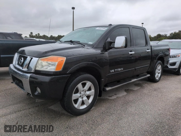 2010 Nissan Titan LE with VIN 1N6BA0EC8AN318538, listed as a Copart auction lot 74122194 with Not Provided miles and Salvage Title. Bid and sale history available at carsss.com. Image 1.