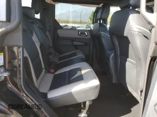 2024 Ford Bronco Wildtrak z VIN 1FMEE2BP1RLA54539, wystawiony jako Copart lot #46310905 z przebiegiem 12 545 mil mil oraz Szkody całkowita. Historia ofert i sprzedaży dostępna na DreamBid. Obrazek 11.