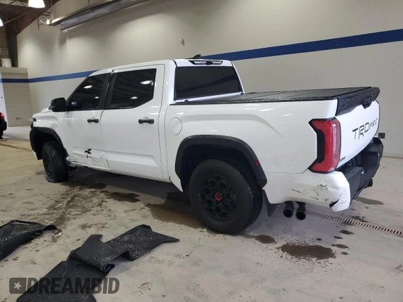2024 Toyota Tundra TRD Pro Hybrid with VIN 5TFPC5DB7RX081484, listed as a Copart auction lot 57246415 with 12,819 mi miles and Salvage title. Bid and sale history available at DreamBid. Image 2.