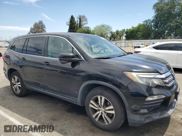 2017 Honda Pilot EX-L with VIN 5FNYF5H50HB000771, listed as a Copart auction lot 52611255 with 84,922 mi miles and Salvage Title. Bid and sale history available at carsss.com. Image 4.