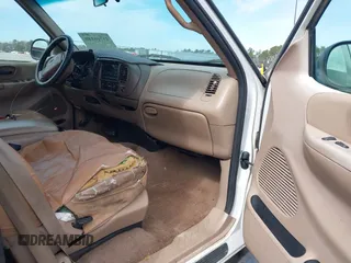 1999 Ford F-150 XL with VIN 1FTRX18LXXNA16159, listed as a IAAI auction lot 41746440 with 999,999 mi miles. Bid and sale history available at carsss.com. Image 5.