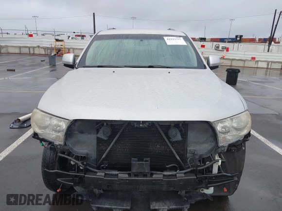 2013 Dodge Durango Crew z VIN 1C4RDJDGXDC637572, wystawiony jako IAAI lot #41922757 z przebiegiem 110 941 mil mil oraz . Historia ofert i sprzedaży dostępna na DreamBid. Obrazek 13.