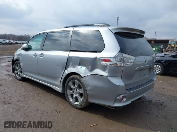 2011 Toyota Sienna SE with VIN 5TDXK3DC1BS096963, listed as a IAAI auction lot 41676328 with 168,436 mi miles. Bid and sale history available at carsss.com. Image 3.