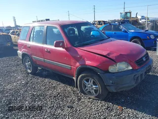 2000 Honda CR-V EX with VIN JHLRD1863YC051709, listed as a IAAI auction lot 41678500 with 197,313 mi miles. Bid and sale history available at carsss.com. Image 1.