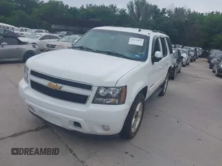 2007 Chevrolet Tahoe LT z VIN 1GNFC13027R112945, wystawiony jako IAAI lot #42178102 z przebiegiem 202 858 mil mil oraz . Historia ofert i sprzedaży dostępna na DreamBid. Obrazek 2.
