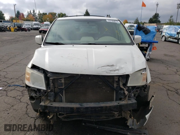 2010 Dodge Grand Caravan SXT with VIN 2D4RN5D11AR331804, listed as a Copart auction lot 73735873 with 183,923 mi miles and Salvage Title. Bid and sale history available at DreamBid. Image 5.