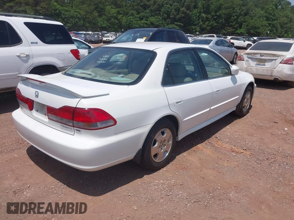 2002 Honda Accord EX z VIN 1HGCG16592A037760, wystawiony jako IAAI lot #42334100 z przebiegiem 271 805 mil mil oraz . Historia ofert i sprzedaży dostępna na DreamBid. Obrazek 4.