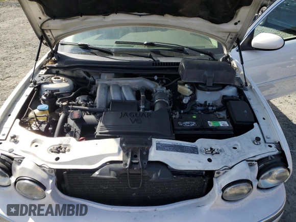 2006 Jaguar X-Type with VIN SAJWA51A06WE68591, listed as a Copart auction lot 53020355 with 179,379 mi miles and Salvage Title. Bid and sale history available at DreamBid. Image 11.