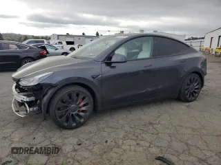 2024 Tesla Model Y Performance with VIN 7SAYGDEF7RF093054, listed as a Copart auction lot 50747985 with 26,907 mi miles and Salvage Title. Bid and sale history available at DreamBid. Image 1.