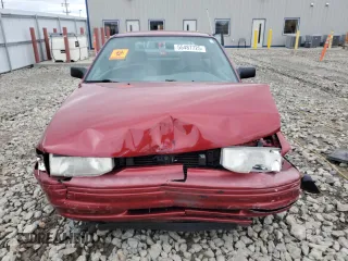 1996 Ford Escort z VIN 3FASP11J6TR151727, wystawiony jako Copart lot #55487725 z przebiegiem 118 276 mil mil oraz Nie do naprawy. Historia ofert i sprzedaży dostępna na DreamBid. Obrazek 5.