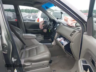 2006 Honda Pilot EX-L with VIN 5FNYF18776B011211, listed as a IAAI auction lot 39555749 with 295,998 mi miles and . Bid and sale history available at DreamBid. Image 5.
