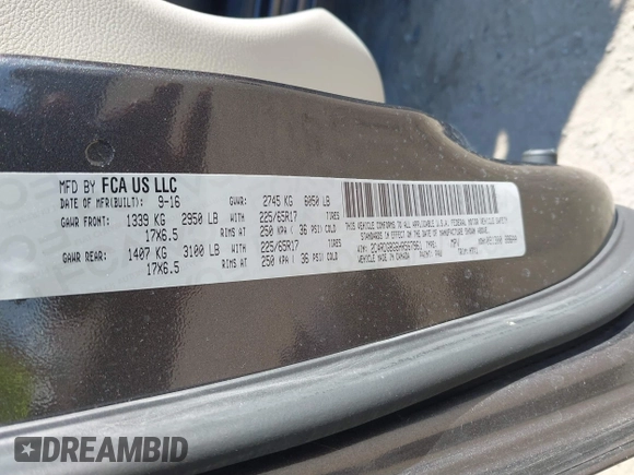 2017 Dodge Grand Caravan SE with VIN 2C4RDGBG6HR567961, listed as a IAAI auction lot 41405790 with 102,437 mi miles and . Bid and sale history available at DreamBid. Image 9.